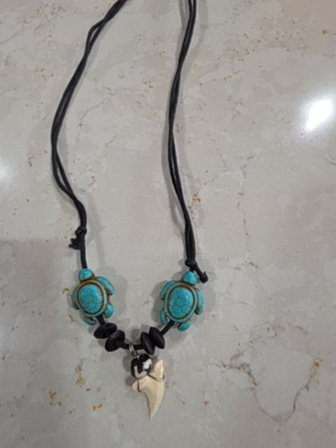 Necklace rope blue turtle pendants