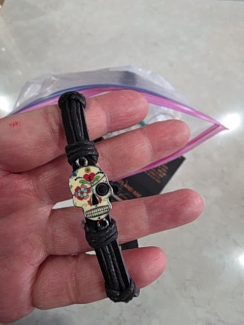 Bracelet black rope or leather skull