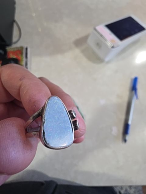 925 ring with light blue white teardrop stone