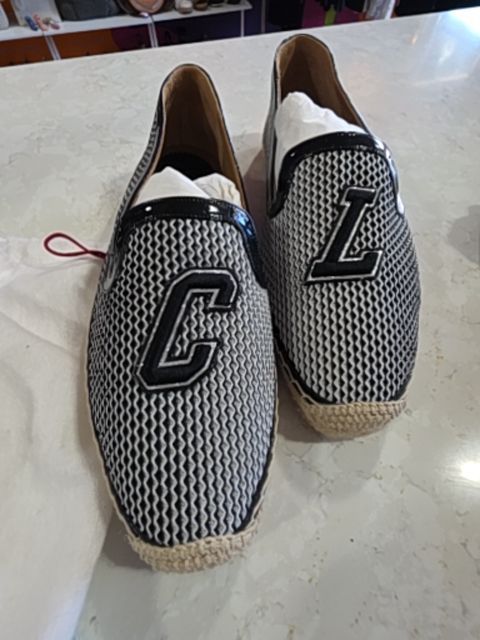 LOUBOUTIN SLIP ONS CANVAS